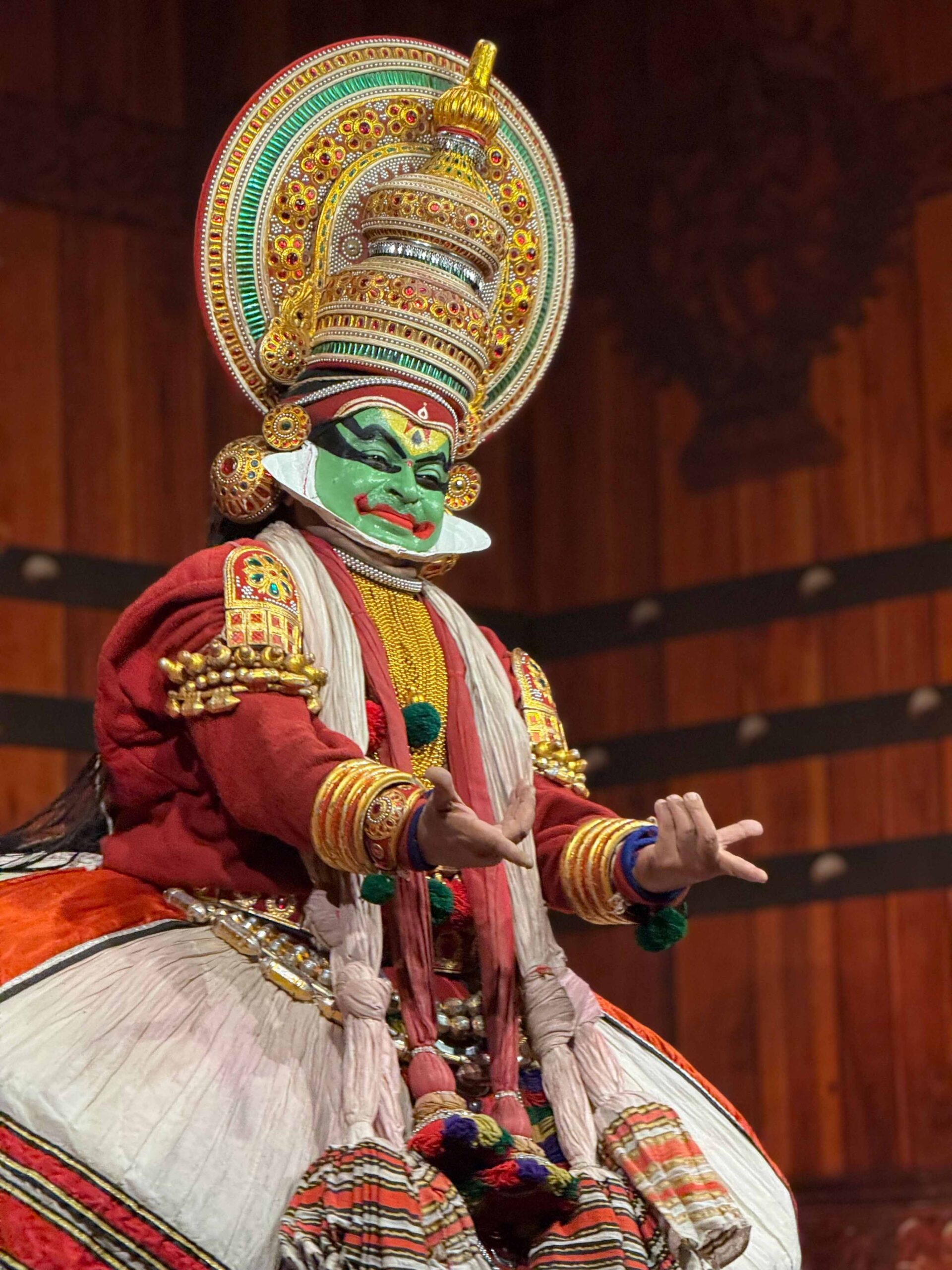 A Kathakali performer in traditional costume